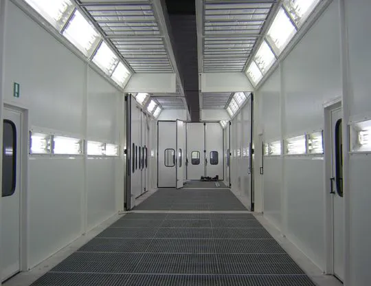 Three-stage pressurized painting-drying booth with a total length of 30 meters with upper opening along its entire length for inserting pieces with overhead crane