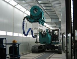 Four-stage pressurized painting-drying booth (16 + 8 + 8 + 16 meters) for a total length of 48 meters. Top opening over its entire length for inserting pieces with overhead crane