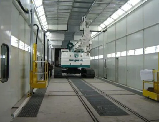 Four-stage pressurized painting-drying booth (16 + 8 + 8 + 16 meters) for a total length of 48 meters. Top opening over its entire length for inserting pieces with overhead crane