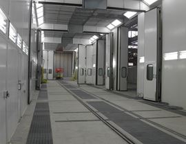 Four-stage pressurized painting-drying booth (10 + 10 + 10 + 10 meters) for a total length of 40 meters. Front and side openings