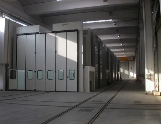 Pressurized oven booth with four independent stages with tracks for sliding piece holder trolleys and total upper opening for inserting pieces even with overhead crane