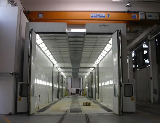 Pressurized oven booth with four independent stages with tracks for sliding piece holder trolleys and total upper opening for inserting pieces even with overhead crane