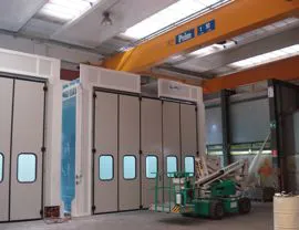 Cabine forno pressurizzate con sistema filtrante a secco e aperture superiori per inserimento pezzi con carroponte