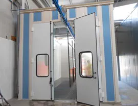 Cabina di lavaggio manuale pezzi con ingresso bilancella su binario