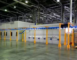 Polymerization oven and pressurized chamber for powder booth