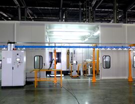 Powder booth with PVC "sandwich" paneling with two automatic stations and two external manual stations, installed inside a special pressurized cleaning room