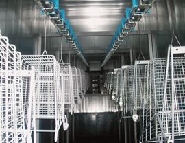 Ascent / descent of pieces in bell-type oven - painting system for supermarket trolleys