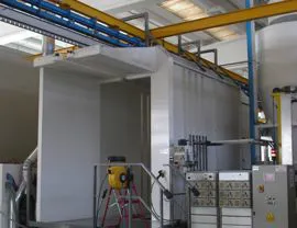 Powder painting booth with dust recovery made with PVC "sandwich" paneling and with two automatic stations and two external manual stations for pre and post retouching