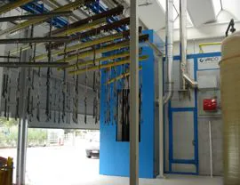 Accumulation of hangers leaving the oven