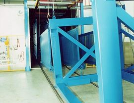 Impianto di verniciatura polveri con convogliatore aereo a due linee parallele per pezzi fino a Lu 8.000 mm