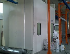 Vertical air flow powder painting booth on a metal basement
